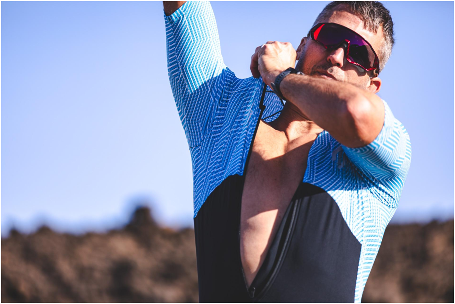 First-time triathlete wearing a tri suit during a sprint triathlon, demonstrating practical race-day clothing and beginner triathlon gear